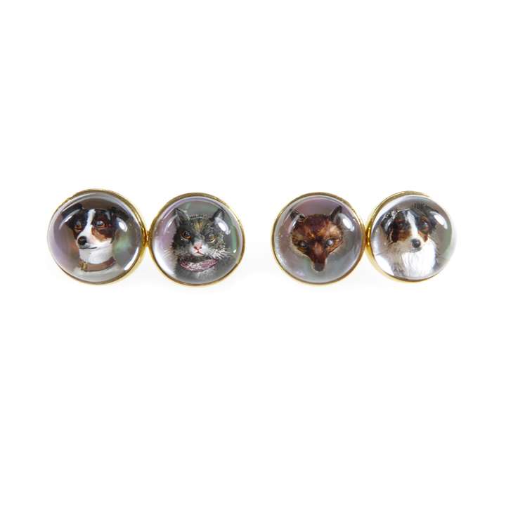 Pair of 18ct gold mounted 'Essex crystal' cufflinks featuring animal heads